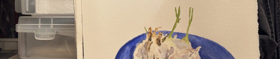 Photo of watercolor painting of some sprouting garlic bulbs on a blue plate